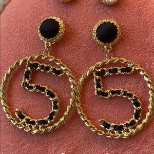 No 5 gold and black earrings